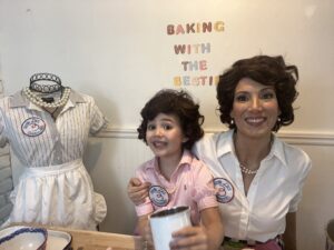 Gia and Cristina posing for the baking show